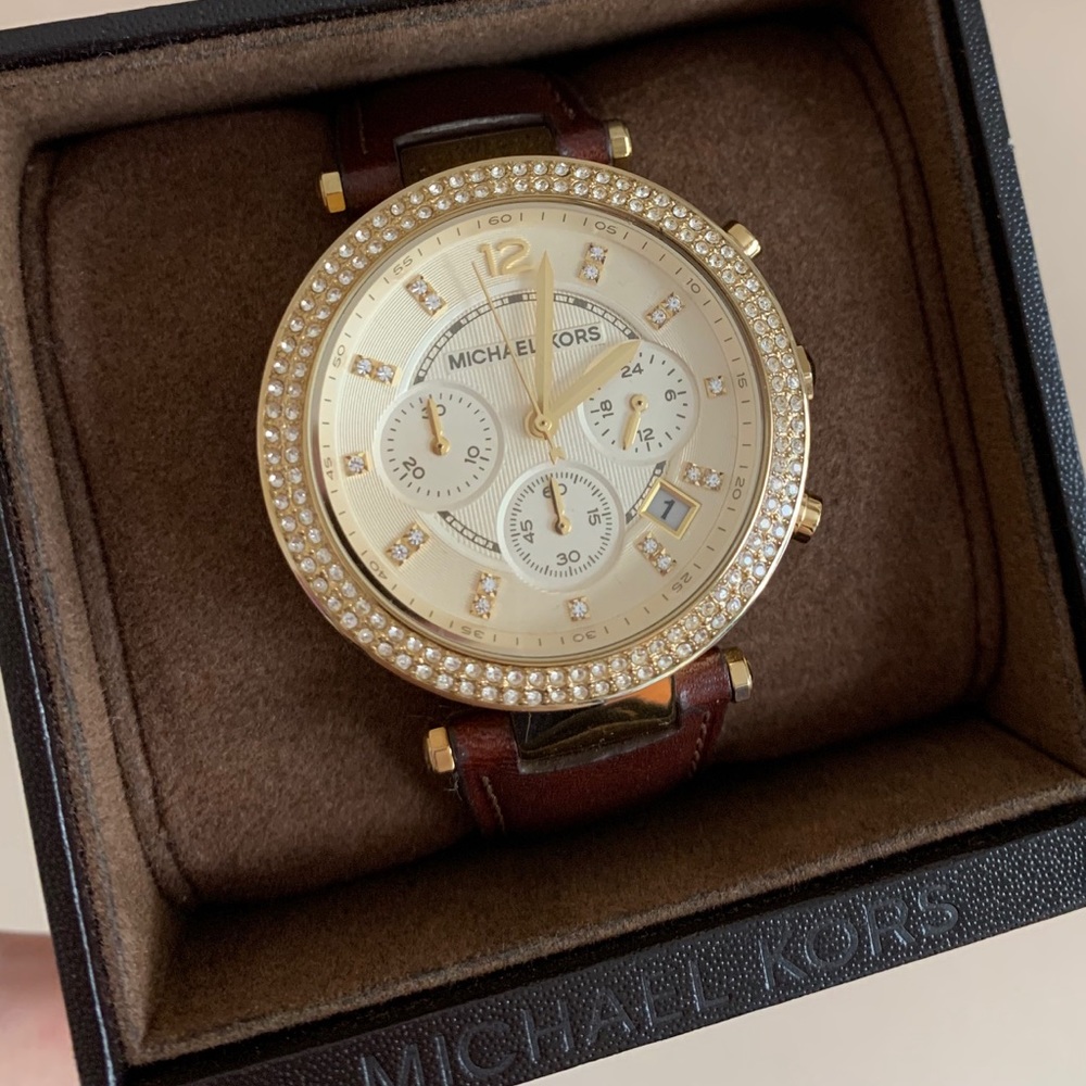 Pre love Michael Kors watch in gold color
